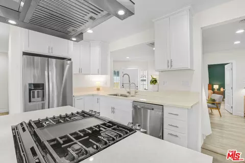 Kitchen - 605 S Sloan Ave, Compton, CA 90221 photo 2 of 3