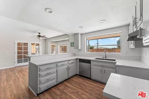 Kitchen - 15361 Mondamon Rd, Apple Valley, CA 92307 photo 3 of 4