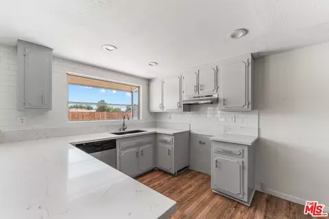 Kitchen - 15361 Mondamon Rd, Apple Valley, CA 92307 photo 2 of 4