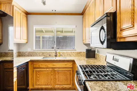 Kitchen - 7969 Celeste Ave, Fontana, CA 92336 photo 2 of 2