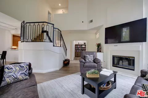 Living - 12630 Springbrook Dr #E, San Diego, CA 92128 photo 2 of 5
