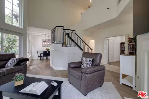 Living - 12630 Springbrook Dr #E, San Diego, CA 92128 photo 4 of 5