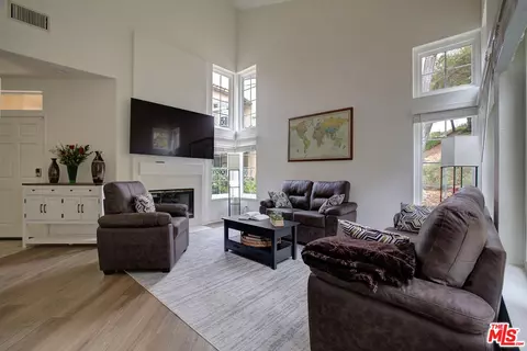 Living - 12630 Springbrook Dr #E, San Diego, CA 92128 photo 3 of 5