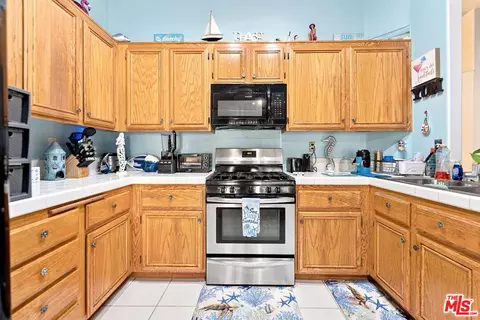 Kitchen - 2462 N Lancewood Ave, Rialto, CA 92377 photo 2 of 3