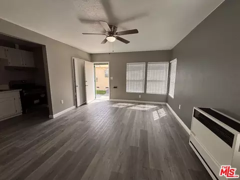Living - 1000 N Sloan Ave, Compton, CA 90221 photo 2 of 2
