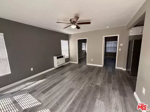 Living - 1000 N Sloan Ave, Compton, CA 90221 photo 1 of 2