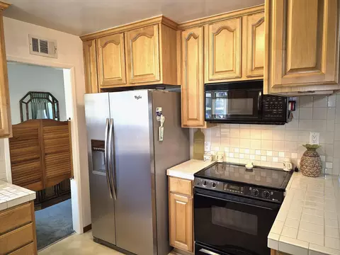 Kitchen - 7703 Cassia Ave, Riverside, CA 92504 photo 3 of 4