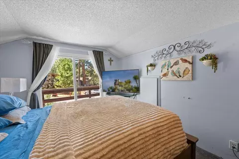 Bedroom - 819 Holmes Ln, Sugarloaf, CA 92386 photo 8 of 12