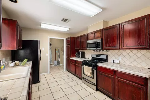 Kitchen - 53185 Eisenhower Dr, La Quinta, CA 92253 photo 3 of 5
