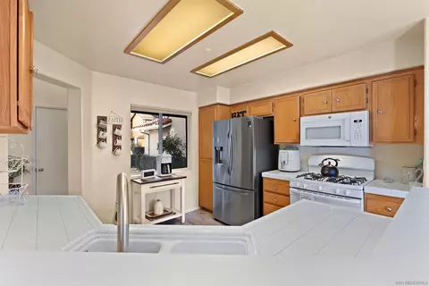 Kitchen - 395 Whispering Willow Dr #C, Santee, CA 92071 photo 4 of 4