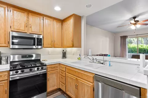 Kitchen - 1469 Rancho Rose Way #25, Oceanside, CA 92057 photo 2 of 3
