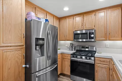 Kitchen - 1469 Rancho Rose Way #25, Oceanside, CA 92057 photo 3 of 3