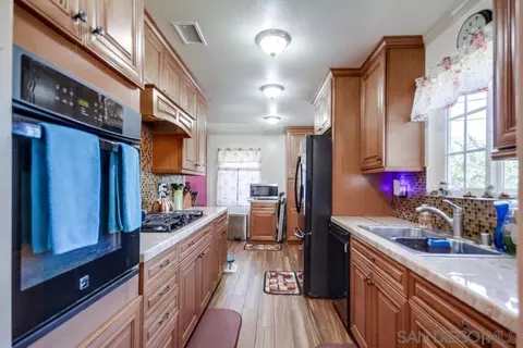 Kitchen - 7949 Poplin Dr, Santee, CA 92071 photo 3 of 4