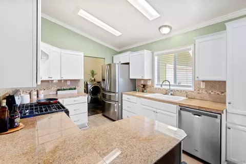 Kitchen - 15935 Spring Oaks Rd #102, El Cajon, CA 92021 photo 2 of 3