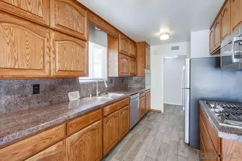 Kitchen - 7568 Ohio Pl, La Mesa, CA 91942 photo 2 of 5