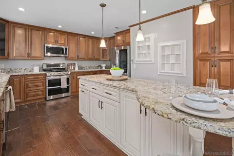 Kitchen - 2556 S Cimarron Ter, Escondido, CA 92029 photo 2 of 3