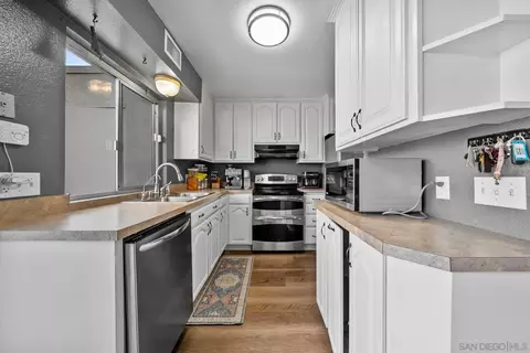 Kitchen - 9416 Carlton Oaks Dr #E, Santee, CA 92071 photo 1 of 2