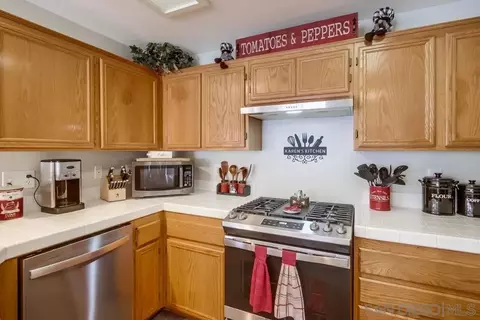 Kitchen - 335 Whispering Willow Dr #A, Santee, CA 92071 photo 3 of 4