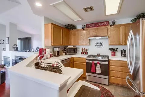 Kitchen - 335 Whispering Willow Dr #A, Santee, CA 92071 photo 2 of 4