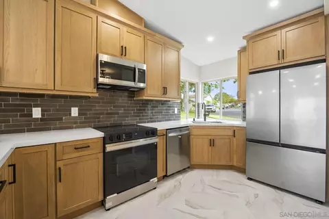 Kitchen - 6915 Pear Tree Dr, Carlsbad, CA 92011 photo 3 of 5