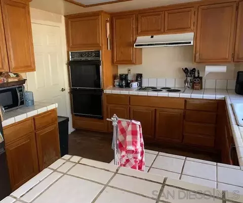 Kitchen - 43982 Highlander Dr, Temecula, CA 92592 photo 2 of 2