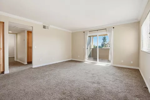 Living - 5033 Los Morros Way #55, Oceanside, CA 92057 photo 6 of 8