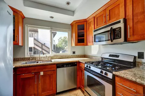 Kitchen - 9837 Caspi Gardens Dr 7, Santee, CA 92071 photo 1 of 2