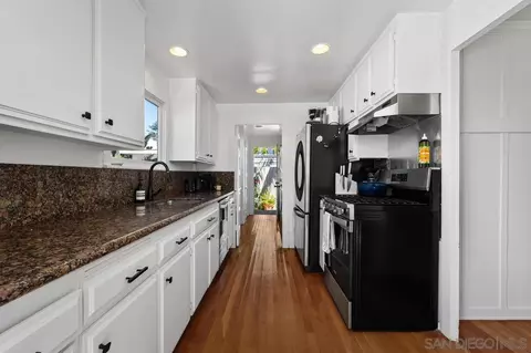 Kitchen - 7847-49 Exchange Pl, La Jolla, CA 92037 photo 2 of 3