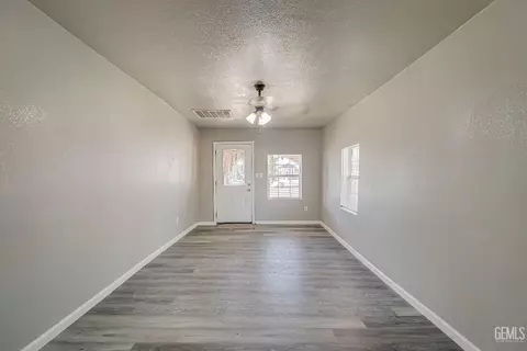 Living - 329 W 3rd St, Buttonwillow, CA 93206 photo 2 of 3