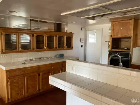 Kitchen - 1302 E 19th St, Bakersfield, CA 93305 photo 1 of 2