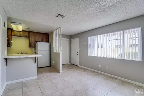 Living - 3840 White Ln, Bakersfield, CA 93309 photo 7 of 9