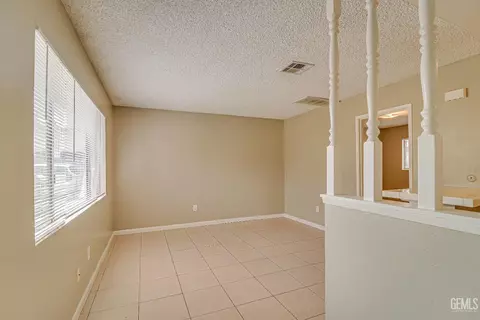 Living - 3840 White Ln, Bakersfield, CA 93309 photo 4 of 9