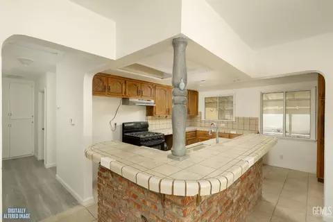 Kitchen - 1441 W Jenner St, Lancaster, CA 93534 photo 3 of 3