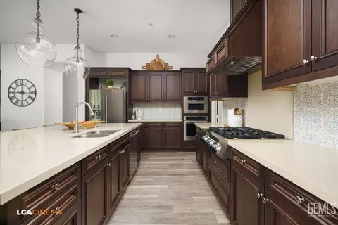 Kitchen - 11702 Raindrop Ln, Bakersfield, CA 93311 photo 2 of 2