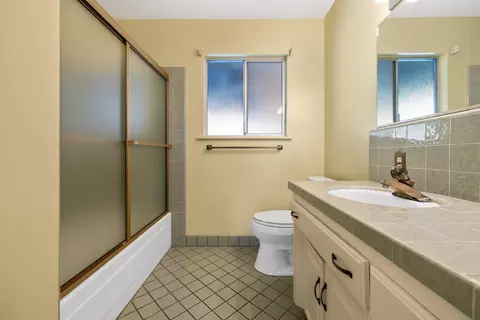 Bath - 296 E Gannon Dr, Tulare, CA 93274 photo 2 of 3