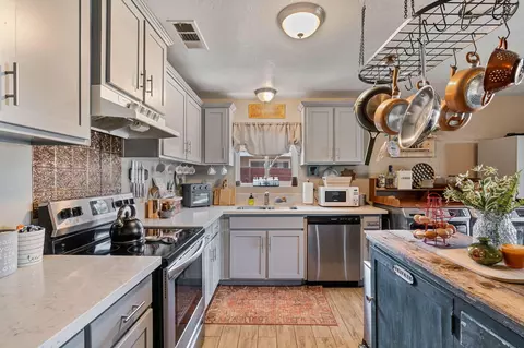 Kitchen - 947 E Ciinamon Dr, Lemoore, CA 93245 photo 2 of 4