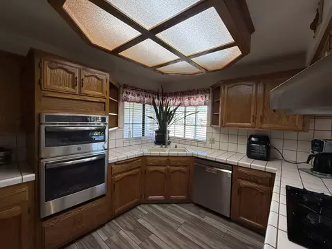 Kitchen - 315 E Washington Ave, Tulare, CA 93274 photo 1 of 2