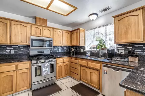 Kitchen - 717 E Spring Ln, Lemoore, CA 93245 photo 4 of 5