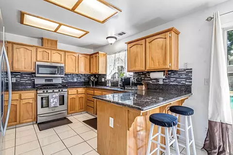 Kitchen - 717 E Spring Ln, Lemoore, CA 93245 photo 2 of 5