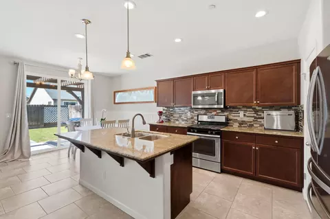Kitchen - 1383 E Donnybrook Pl, Hanford, CA 93230 photo 4 of 5