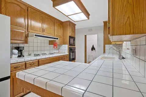 Kitchen - 1716 E Academy Ave, Tulare, CA 93274 photo 2 of 3