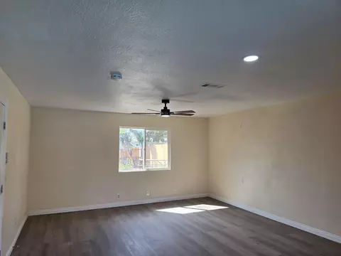 Living - 1482 E Walnut Ave, Tulare, CA 93274 photo 2 of 2