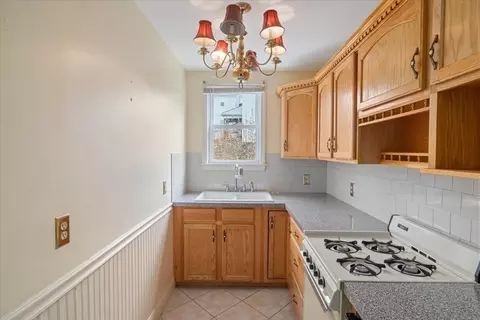 Kitchen - 128 Diman St, Fall River, MA 02721 photo 2 of 5