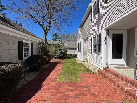 Exterior - 209 Dunrobin Rd, Mashpee, MA 02649 photo 4 of 7