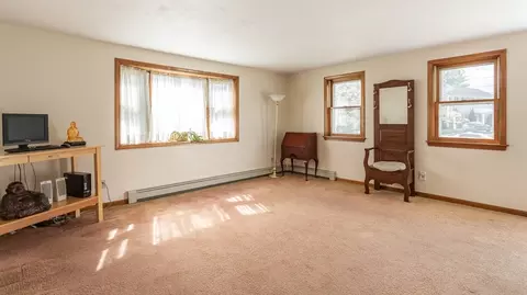 Living - 25 Quequechan Cir, Raynham, MA 02767 photo 2 of 3