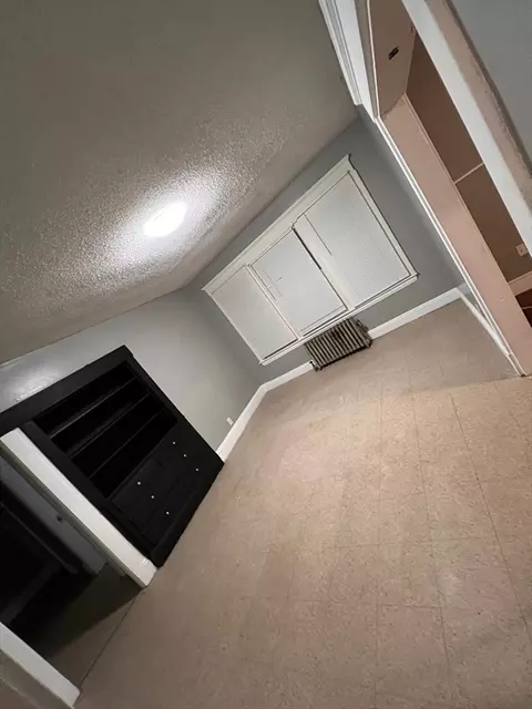 Living - 373 White St, Springfield, MA 01108 photo 2 of 2