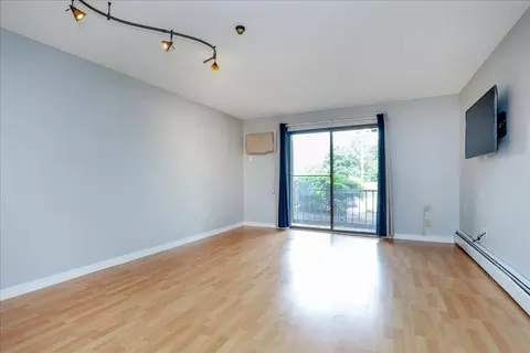 Living - 147 Sylvan St #10A, Danvers, MA 01923 photo 1 of 7