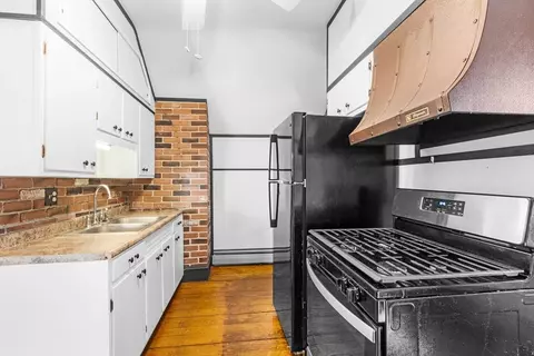 Kitchen - 387 Sprague St, Fall River, MA 02724 photo 2 of 3