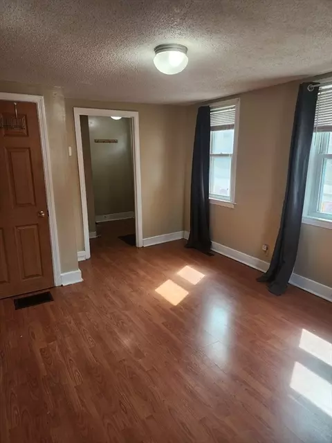 Living - 34 Spring St, Chicopee, MA 01013 photo 1 of 2