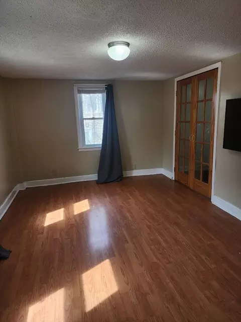 Living - 34 Spring St, Chicopee, MA 01013 photo 2 of 2